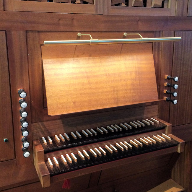 case mounted organ music lamp
